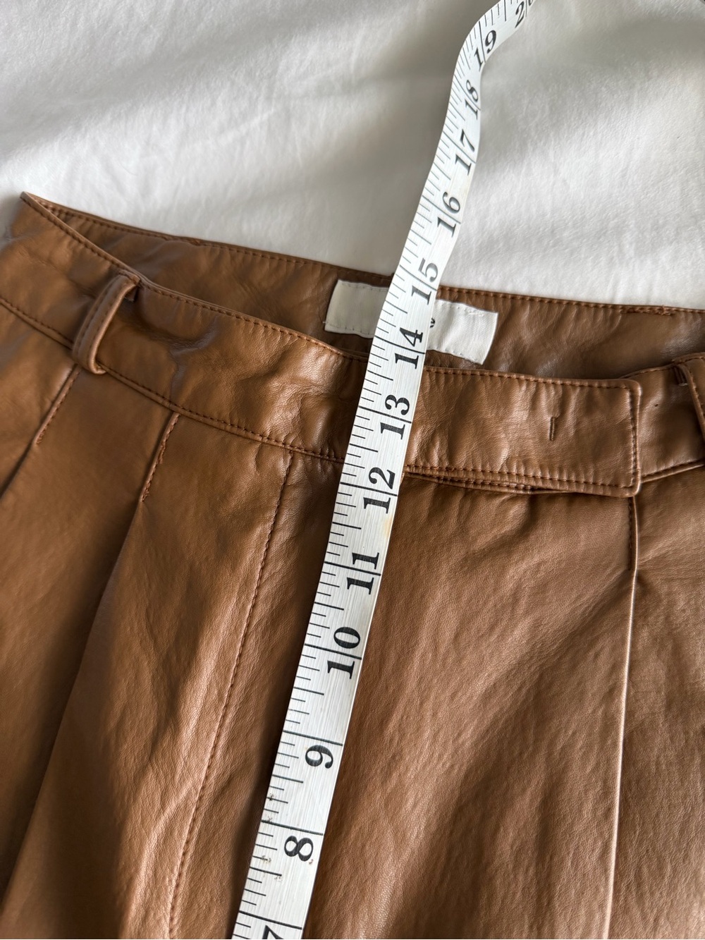 The Frankie Shop Pernille Pleated Faux Leather Shorts in Brown - Picture 15 of 16